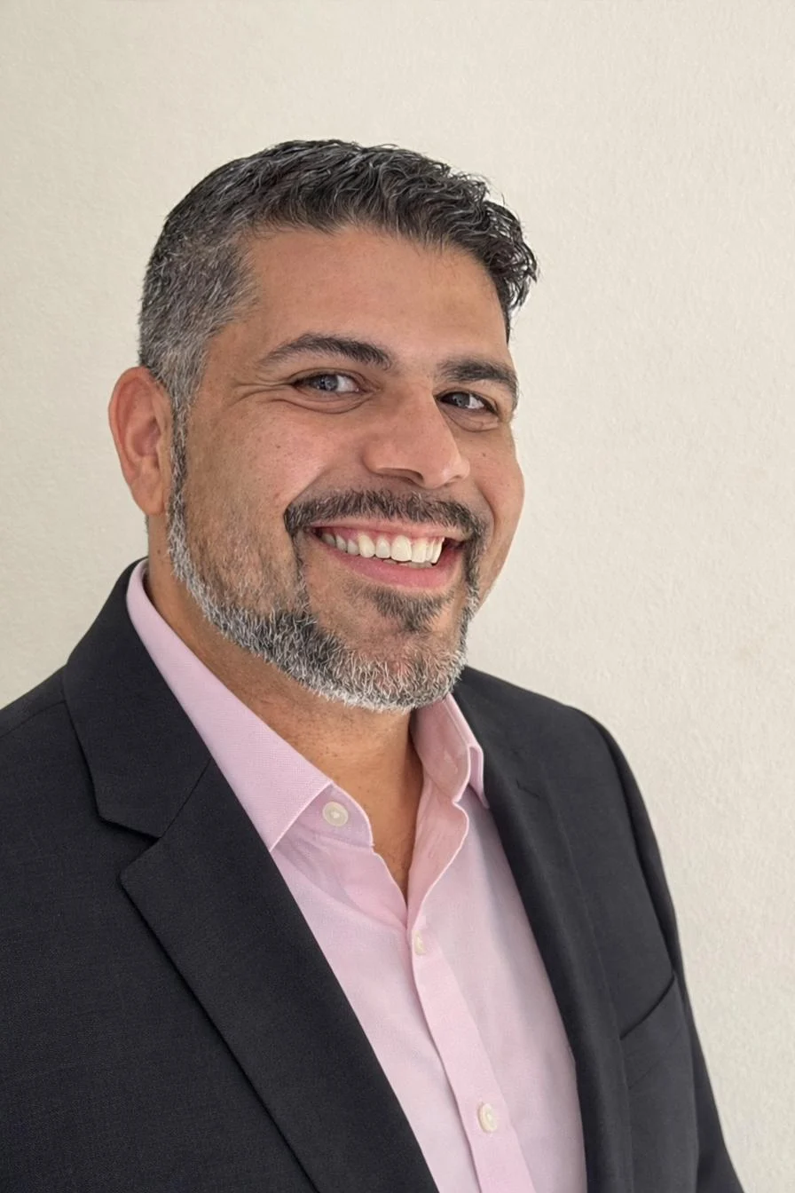 Portrait of John Alvarado